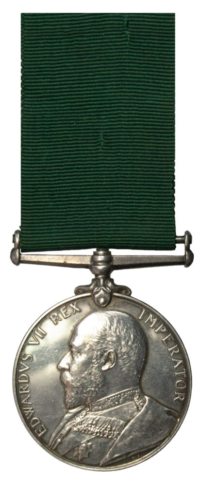 Volunteer Long Service Medal to Sjt. J.R. Sharp