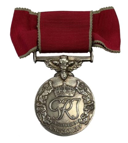 A British Empire Medal, GRI, (Civil Division), on ladies’ bow, to Mrs Hilda Illingworth
